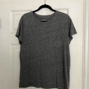 Size L tshirt with pocket fits like a medium
